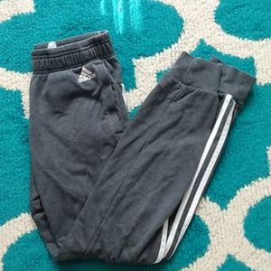 Grey joggers with white stripes
